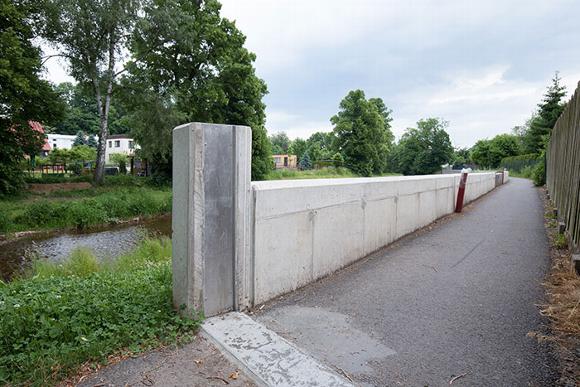 Flood prevention wall next to river in Uk